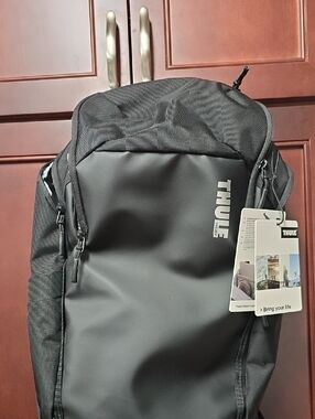 NWT. Thule Black Chasm Laptop Backpack 26L with Sleek Front Panel